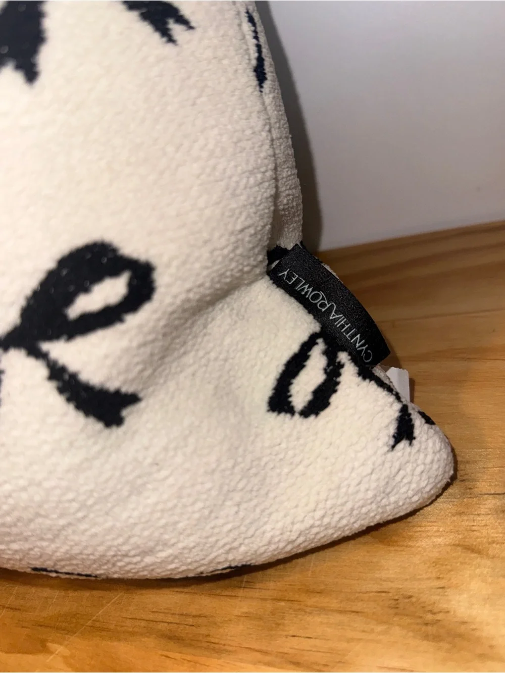 Cynthia Rowley Ivory Throw Pillow with Black Bow Pattern